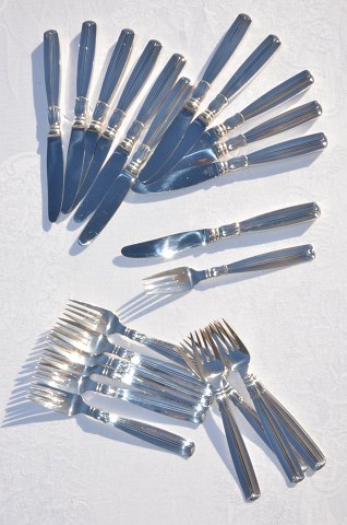 Lotus silver cutlery for 12 persons