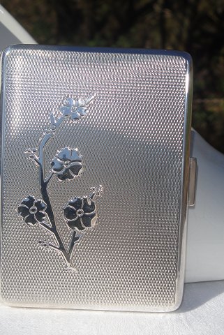 Silver cigarette case, Sold