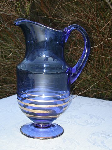 Large blue glass jug