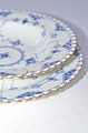 Royal Copenhagen 
full lace with gold Plates 1084 & 1079