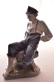 Royal Copenhagen  Figurine Boy on rock